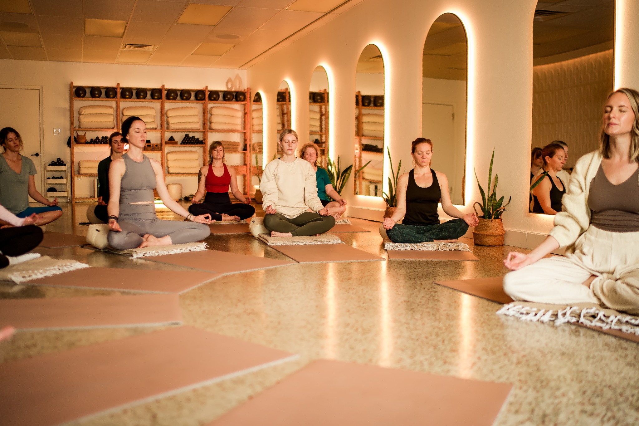 Guests practicing restorative movement together in Lovelock Studio C